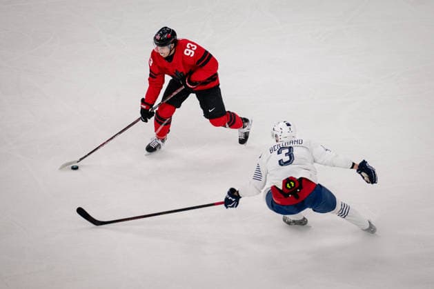 Mitch Marner (Canada, 93) and Charles Bertrand (France, 3) in action during the Menss Ice hockey, Eishockey group stage game between Canada and France at the Olympic Winter games, Winterspiele,Spiele, Summer games Milano Cortina 2026 at the Milano Santa Giulia Ice Hockey Arena, Milan, Italy, on February 15, 2026. im Gruppenspiel der Männer im Eishockey zwischen Kanada und Frankreich bei den Olympischen Winterspielen Milano Cortina 2026 in der Milano Santa Giulia Ice Hockey Arena, Mailand, Italien, am 15. Februar 2026. *** Mitch Marner Canada, 93 and Charles Bertrand France, 3 in action during the Mens ice hockey group stage game between Canada and France at the Olympic Winter Games Milano Cortina 2026 at the Milano Santa Giulia Ice Hockey Arena, Milan, Italy, on February 15, 2026 in the Mens ice hockey group stage game between Canada and France at the Olympic Winter Games Milano Cortina 2026 at the Milano Santa Giulia Ice Hockey Arena, Milan, Italy, on February 15, 2026 Copyright: HMBxMedia MarcxNiemeyer