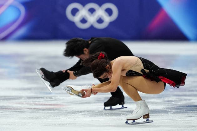 SUI Wenjing HAN Cong competing for the Olympic Figure skating, Eiskunstlauf Pair Skating, Short Program for the Milano Cortina 2026 Winter Olympics, in Milan (Italy) February 15, 2026 (Photo Claudio Furlan LaPresse)  Copyright: xClaudioxFurlan LaPressex
