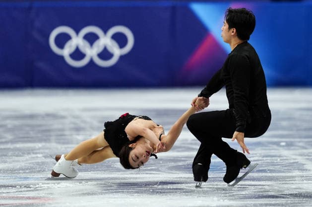 SUI Wenjing HAN Cong competing for the Olympic Figure skating, Eiskunstlauf Pair Skating, Short Program for the Milano Cortina 2026 Winter Olympics, in Milan (Italy) February 15, 2026 (Photo Claudio Furlan LaPresse)  Copyright: xClaudioxFurlan LaPressex