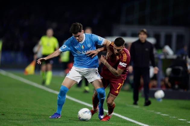 Italy: Serie a football match SSC Napoli vs AS Roma Napoli s Spanish defender Miguel Gutierrez challenges for the ball with Roma™s Italian midfielder Lorenzo Pellegrini during the Serie A football match between SSC Napoli and AS Roma at the Diego Armando Maradona Stadium in Naples, February 15, 2026. _BPH3220 Copyright: xAntonioxBalascox