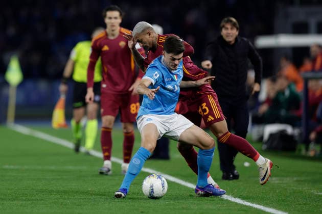 Italy: Serie a football match SSC Napoli vs AS Roma Roma™s Brazilian defender Wesley challenges for the ball with Napoli s Spanish defender Miguel Gutierrez during the Serie A football match between SSC Napoli and AS Roma at the Diego Armando Maradona Stadium in Naples, February 15, 2026. _BPH2830 Copyright: xAntonioxBalascox