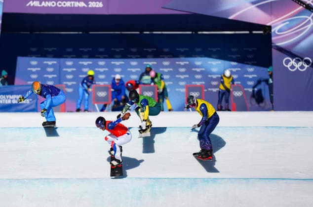 (260215) -- LIVIGNO, Feb. 15, 2026 -- Huw Nightingale (1st R) of Team Britain 1 competes during the mixed team snowboard cross big final at the Milan-Cortina 2026 Olympic Winter games, Winterspiele,Spiele, Summer games in Livigno, Italy, Feb. 15, 2026. ) (MICO2026)ITALY-LIVIGNO-OLYMPIC WINTER GAMES-MIXED TEAM SNOWBOARD CROSS XiaxYifang 