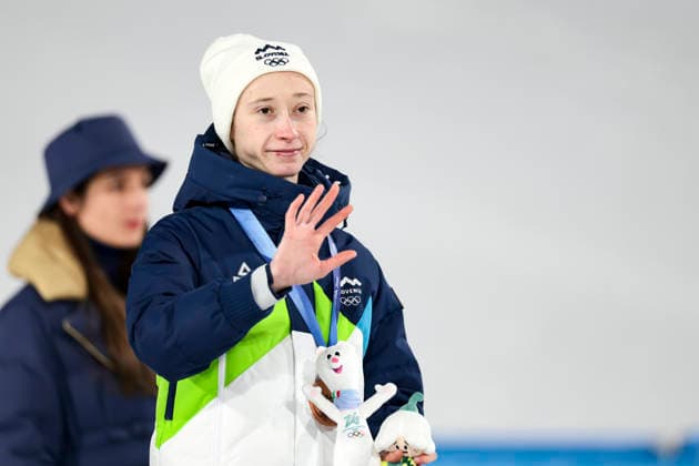 OLYMPICS - Winter Olympic Games, Olympische Spiele, Olympia, OS Milano Cortina 2026 PREDAZZO,ITALY,15.FEB.26 - OLYMPICS, Ski jumping, Skispringen, Ski, nordisch - Winter Olympic Games Milano Cortina 2026, large hill, women, medal ceremony. Image shows the rejoicing of Nika Prevc (SLO). Keywords: medal, mascot.  GEPAxpictures xMatthiasxTrinkl