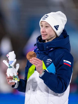 OLYMPICS - Winter Olympic Games, Olympische Spiele, Olympia, OS Milano Cortina 2026 PREDAZZO,ITALY,15.FEB.26 - OLYMPICS, Ski jumping, Skispringen, Ski, nordisch - Winter Olympic Games Milano Cortina 2026, large hill, women, medal ceremony. Image shows Nika Prevc (SLO) with her medal.  GEPAxpictures xOliverxLerch