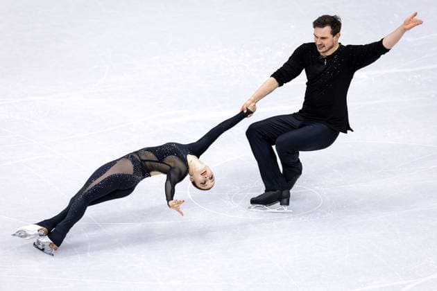 MILAN - Michel Tsiba and Daria Danilova during the short Figure skating, Eiskunstlauf routine in pairs at the Milan Ice Skating Arena at the Milan Winter Olympics. ROBIN VAN LONKHUIJSEN ANP xVIxANPxSportx xxANPxIVx 550820076 originalFilename: 550820076.jpg