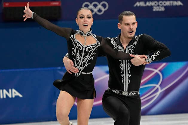 Karina Akopova and Nikita Rakhmanin of Armenia skate together during the Pairs Figure skating, Eiskunstlauf Short Program at the Milano Figure Skating Arena in Milan, Italy on Sunday, February 15, 2026.  OLY20260215101 RichardxEllis