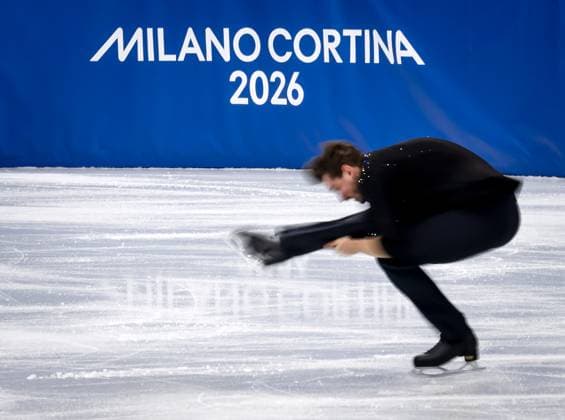 MILAN - Michel Tsiba during the short Figure skating, Eiskunstlauf routine in pairs at the Milan Ice Skating Arena during the Milan Winter Olympics. SEM VAN DER WAL ANP xVIxANPxSportx xxANPxIVx 550820810 originalFilename: 550820810.jpg
