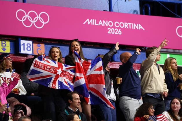 February 15, 2026, Milan, Lombardy, Italy: British fans of ANASTASIA VAIPAN-LAW and LUKE DIGBY cheer for them as they skate their short program in the Pairs of the Figure skating, Eiskunstlauf at the Milano Cortina 2026 Winter Olympic Games, Olympische Spiele, Olympia, OS Milan Italy - ZUMAc179 20260215_oly_c179_093 Copyright: xMickaelxChavetx