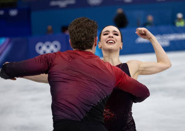 February 15, 2026, Milano, Lombardy, Italy: Lia Pereira (9-1) of Canada and Trennt Michaud (9-2) of Canada perform in Ice Skating Pairs Short Program during the 2026 Winter Olympics at the Milano Ice Skating Arena on Sunday in Milano. Milano Italy - ZUMAj89_ 20260215_oly_j89_024 Copyright: xPaulxKitagakixJr.x
