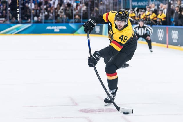 MILANO, ITALY - FEBRUARY 15: Lukas Kalble (Germany, 49) shoots during the Ice hockey, Eishockey Men United States of America vs Germany - Preliminary Round - Group C at the Milano Cortina 2026 Olympics at Milano Santagiulia Ice Hockey Arena on day 9 of the Milano Cortina 2026 Olympics on February 15, 2026 in Milano, Italy. Editorial use only. Italy Copyright: xSteffiexWunderlx