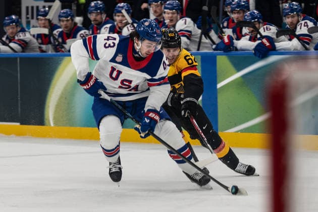 Quinn Hughes (United States of America, 43) and Parker Tuomie (Germany, 62) in action during the Menss Ice hockey, Eishockey group stage game between the United States (USA) and Germany (GER) at the Olympic Winter games, Winterspiele,Spiele, Summer games Milano Cortina 2026 at the Milano Santa Giulia Ice Hockey Arena, Milan, Italy, on February 15, 2026. im Gruppenspiel der Männer im Eishockey zwischen den USA (USA) und Deutschland (GER) bei den Olympischen Winterspielen Milano Cortina 2026 in der Milano Santa Giulia Ice Hockey Arena, Mailand, Italien, am 15. Februar 2026. *** Quinn Hughes United States of America, 43 and Parker Tuomie Germany, 62 in action during the Mens ice hockey group stage game between the United States USA and Germany GER at the Olympic Winter Games Milano Cortina 2026 at the Milano Santa Giulia Ice Hockey Arena, Milan, Italy, on February 15, 2026 in the Mens ice hockey group stage game between the United States USA and Germany GER at the Olympic Winter Games Milano Cortina 2026 at the Milano Santa Giulia Ice Hockey Arena, Milan, Italy, on February 15, 2026 Copyright: HMBxMedia MarcxNiemeyer