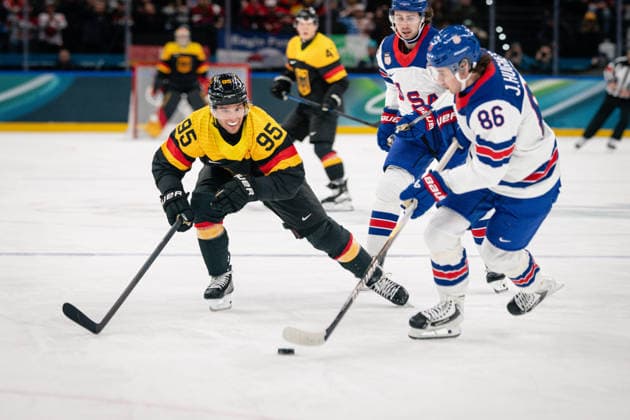 Frederik Tiffels (Germany, 95) and Jack Hughes (United States of America, 86) in action during the Menss Ice hockey, Eishockey group stage game between the United States (USA) and Germany (GER) at the Olympic Winter games, Winterspiele,Spiele, Summer games Milano Cortina 2026 at the Milano Santa Giulia Ice Hockey Arena, Milan, Italy, on February 15, 2026. im Gruppenspiel der Männer im Eishockey zwischen den USA (USA) und Deutschland (GER) bei den Olympischen Winterspielen Milano Cortina 2026 in der Milano Santa Giulia Ice Hockey Arena, Mailand, Italien, am 15. Februar 2026. *** Frederik Tiffels Germany, 95 and Jack Hughes United States of America, 86 in action during the Mens ice hockey group stage game between the United States USA and Germany GER at the Olympic Winter Games Milano Cortina 2026 at the Milano Santa Giulia Ice Hockey Arena, Milan, Italy, on February 15, 2026 in the Mens ice hockey group stage game between the United States USA and Germany GER at the Olympic Winter Games Milano Cortina 2026 at the Milano Santa Giulia Ice Hockey Arena, Milan, Italy, on February 15, 2026 Copyright: HMBxMedia MarcxNiemeyer