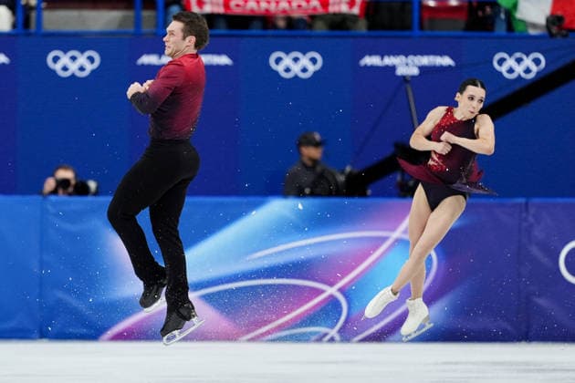 PEREIRA Lia MICHAUD Trennt competing for the Olympic Figure skating, Eiskunstlauf Pair Skating, Short Program for the Milano Cortina 2026 Winter Olympics, in Milan (Italy) February 15, 2026 (Photo Claudio Furlan LaPresse)  Copyright: xClaudioxFurlan LaPressex