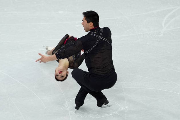 CHAN Emily HOWE Spencer Akira competing for the Olympic Figure skating, Eiskunstlauf Pair Skating, Short Program for the Milano Cortina 2026 Winter Olympics, in Milan (Italy) February 15, 2026 (Photo Claudio Furlan LaPresse)  Copyright: xClaudioxFurlan LaPressex