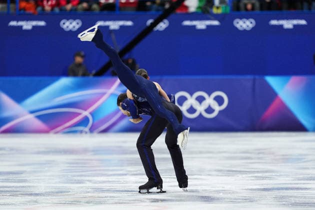 Italy s Rebecca Ghilardi and Filippo Ambrosini during the Figure skating, Eiskunstlauf Pair Skating Short Program at the Milano Cortina 2026 Winter Olympics, in Milan (Italy) February 15, 2026 (Photo Claudio Furlan LaPresse)  Copyright: xClaudioxFurlan LaPressex