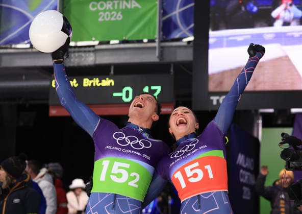 (260215) -- CORTINA D AMPEZZO, Feb. 15, 2026 -- Tabitha Stoecker (R) Matt Weston of Britain celebrate after the skeleton mixed team competition at the Milan-Cortina 2026 Olympic Winter games, Winterspiele,Spiele, Summer games in Cortina, Italy, Feb. 15, 2026. ) (MICO2026)ITALY-CORTINA D AMPEZZO-OLYMPIC WINTER GAMES-SKELETON MIXED TEAM DingxXu 