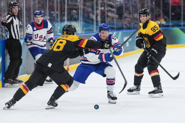 Milano Cortina 2026 Winter Olympics MILAN, ITALY - FEBRUARY 15: USA s Jake Guentzel (2nd R) and Germany s Fabio Wagner (38) compete for the puck during a men s Ice hockey, Eishockey Group C match at the Milano Santagiulia Ice Hockey Arena at the Milano-Cortina 2026 Winter Olympic Games, Olympische Spiele, Olympia, OS in Milan, Italy, on February 15, 2026. Cemal Yurttas Anadolu Milan Italy. Editorial use only. Please get in touch for any other usage.  Copyright: x2026xAnadoluxCemalxYurttasx