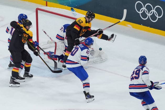 Milano Cortina 2026 Winter Olympics MILAN, ITALY - FEBRUARY 15: USA s JT Miller (10) and Germany s Parker Tuomie (62) compete for the puck during a men s Ice hockey, Eishockey Group C match at the Milano Santagiulia Ice Hockey Arena during the Milano-Cortina 2026 Winter Olympic Games, Olympische Spiele, Olympia, OS in Milan, Italy, on February 15, 2026. Cemal Yurttas Anadolu Milan Italy. Editorial use only. Please get in touch for any other usage.  Copyright: x2026xAnadoluxCemalxYurttasx