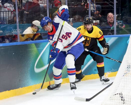 February 15, 2026, Milan, Lombardy, Italy: Tage Thompson 72 of Team United States and Tobias Rieder 8 of Team Germany in men s Ice hockey, Eishockey group C play during the Milano Cortina 2026 Olympic Winter games, Winterspiele,Spiele, Summer games at Milano Santagiulia Ice Hockey Arena. Olympics 2026: Milano Cortina: Ice Hockey-Men Group C - USA-GER  - ZUMAm117 20260215_oly_m117_012 Copyright: xDavidxMcIntyrex