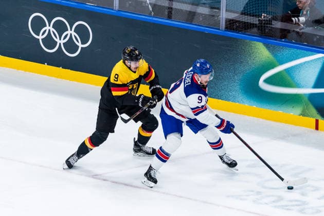 MILANO, ITALY - FEBRUARY 15: Jack Eichel (United States of America, 9) controls the puck against Leon Gawanke (Germany, 9) during the Ice hockey, Eishockey Men United States of America vs Germany - Preliminary Round - Group C at the Milano Cortina 2026 Olympics at Milano Santagiulia Ice Hockey Arena on day 9 of the Milano Cortina 2026 Olympics on February 15, 2026 in Milano, Italy. Editorial use only. Italy Copyright: xSteffiexWunderlx