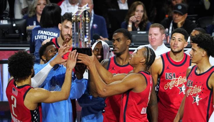 (260216) -- LOS ANGELES, Feb. 16, 2026 -- Team USA Stars lift the championship trophy after the NBA, Basketball Herren, USA All Star Game between Team USA Stripes and Team USA Stars in Los Angeles, the United States, Feb. 15, 2026. ) (SP)U.S.-LOS ANGELES-BASKETBALL-NBA-ALL STAR GAME WuxXiaoling 