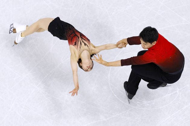 Milan Cortina Olympics: Figure skating, Eiskunstlauf Riku Miura (L) and Ryuichi Kihara of Japan perform in the pairs figure skating short program at the Milan Cortina Olympics at Milano Ice Skating Arena in Milan on Feb. 15, 2026.  A14AA0005291183P