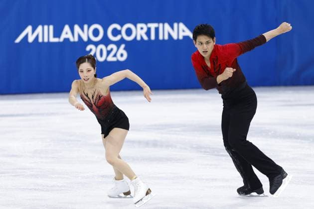 Milan Cortina Olympics: Figure skating, Eiskunstlauf Riku Miura (L) and Ryuichi Kihara of Japan perform in the pairs figure skating short program at the Milan Cortina Olympics at Milano Ice Skating Arena in Milan on Feb. 15, 2026.  A14AA0005291184P