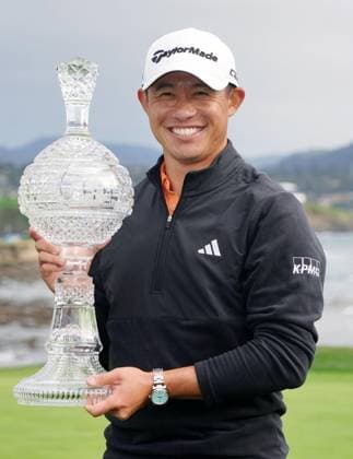 Golf: AT&T Pebble Beach Pro-Am Collin Morikawa of the United States poses with the trophy after winning the AT&amp;T Pebble Beach Pro-Am golf tournament on Feb. 15, 2026, at the Pebble Beach Golf Links in Pebble Beach, California.  A14AA0005291428P