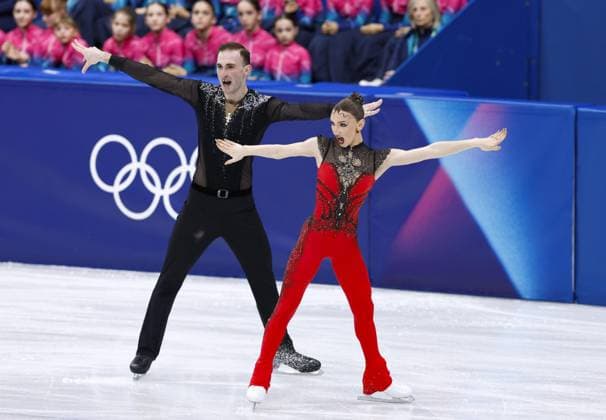Milan Cortina Olympics: Figure skating, Eiskunstlauf Anastasiia Metelkina (R) and Luka Berulava of Georgia perform in the pairs figure skating short program at the Milan Cortina Olympics at Milano Ice Skating Arena in Milan on Feb. 15, 2026.  A14AA0005291447P
