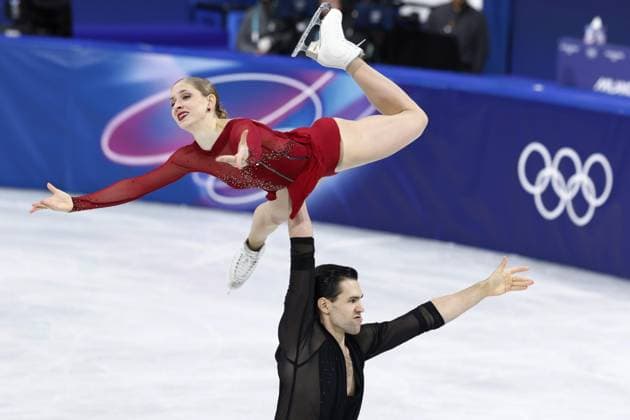 Milan Cortina Olympics: Figure skating, Eiskunstlauf Minerva Fabienne Hase (top) and Nikita Volodin of Germany perform in the pairs figure skating short program at the Milan Cortina Olympics at Milano Ice Skating Arena in Milan on Feb. 15, 2026.  A14AA0005291463P