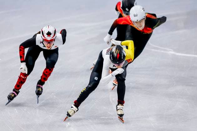 Hanne Desmet of Belgium and Chutong Zhang of China and Florence Brunelle of Canada Women s 1000m Quarterfinals, Milano Cortina 2026 Winter Olympics: Day 10, Short Track Speed skating, Eisschnelllauf - Milano Cortina 2026 Winter Olympics: Day 10, Milano Speed Skating Stadium, February 16, 2026, Milan, Italy.