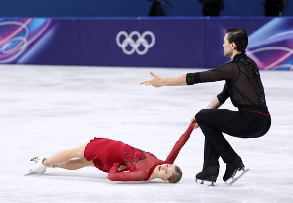 (260216) -- MILAN, Feb. 16, 2026 -- Minerva Fabienne Hase and Nikita Volodin of Germany perform during the Figure skating, Eiskunstlauf pair skating short program match at the Milan-Cortina 2026 Olympic Winter games, Winterspiele,Spiele, Summer games in Milan, Italy, Feb. 15, 2026. ) (MICO2026)ITALY-MILAN-OLYMPIC WINTER GAMES-FIGURE SKATING-PAIR SKATING-SHORT PROGRAM ChenxYichen 