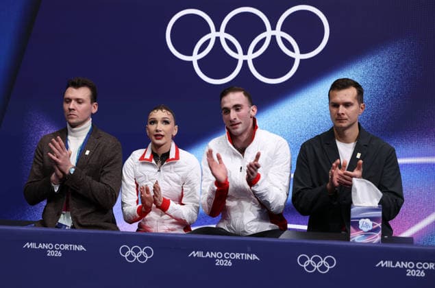 (260216) -- MILAN, Feb. 16, 2026 -- Anastasiia Metelkina and Luka Berulava of Georgia react after their performance during the Figure skating, Eiskunstlauf pair skating short program match at the Milan-Cortina 2026 Olympic Winter games, Winterspiele,Spiele, Summer games in Milan, Italy, Feb. 15, 2026. ) (MICO2026)ITALY-MILAN-OLYMPIC WINTER GAMES-FIGURE SKATING-PAIR SKATING-SHORT PROGRAM ChenxYichen 