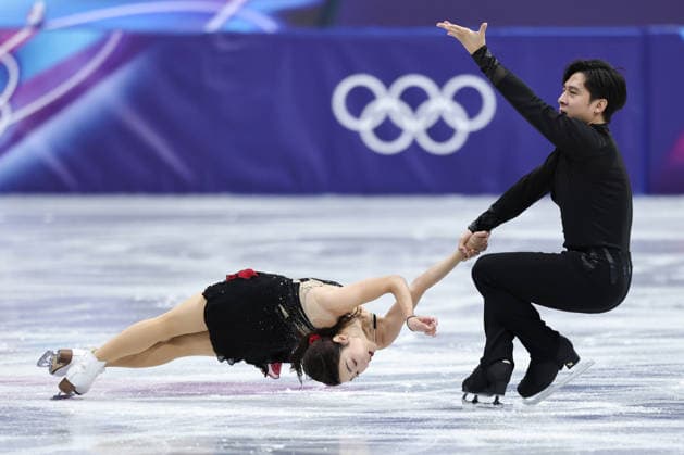 MILAN, ITALY - FEBRUARY 15: Sui Wenjing and Han Cong of Team China compete in Pair Skating - Short Program on day nine of the Milano Cortina 2026 Winter Olympics at Milano Ice Skating Arena on February 15, 2026 in Milan, Italy.  Copyright: xChinaxNewsxServicex 111621726758
