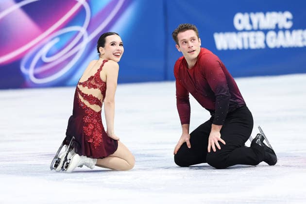 MILAN, ITALY - FEBRUARY 15: Lia Pereira and Trennt Michaud of Team Canada compete in Pair Skating - Short Program on day nine of the Milano Cortina 2026 Winter Olympics at Milano Ice Skating Arena on February 15, 2026 in Milan, Italy.  Copyright: xVCGx 111621708554