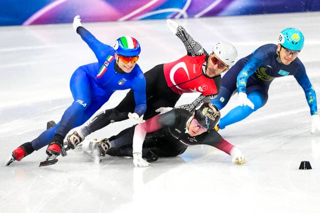 2026-02-16 - Milano Cortina 2026 Winter Olympics MILAN, ITALY - FEBRUARY 16: Pietro Sighel of Italy, Reinis Berzins of Latvia, Furkan Akar of Turkiye, Abzal Azhgaliyev of Kazakhstan performing on the Short Track Speed skating, Eisschnelllauf of the Milano Cortina 2026 Winter Olympics at the Milano Ice Skating Arena on February 16, 2026 in Milan, Italy Milan Milano Ice Skating Arena Italy Content not available for redistribution in The Netherlands directly or indirectly through any third parties. Copyright: xAndrexWeeningx