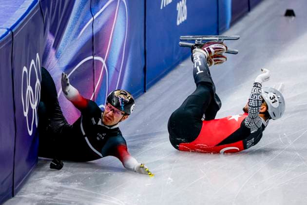 crash Furkan Akar of Turkiye and Reinis Berzins of Latvia Men s 500m, Milano Cortina 2026 Winter Olympics: Day 10, Short Track Speed skating, Eisschnelllauf - Milano Cortina 2026 Winter Olympics: Day 10, Milano Speed Skating Stadium, February 16, 2026, Milan, Italy.
