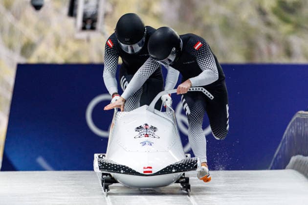 OLYMPICS - Winter Olympic Games, Olympische Spiele, Olympia, OS Milano Cortina 2026 CORTINA D AMPEZZO,ITALY,16.FEB.26 - OLYMPICS, BOBSLEIGH - Winter Olympic Games Milano Cortina 2026, 2-man, men. Image shows Jakob Mandlbauer and Daiyehan-Obafemi Nichols-Bardi (AUT).  GEPAxpictures xMaticxKlansek