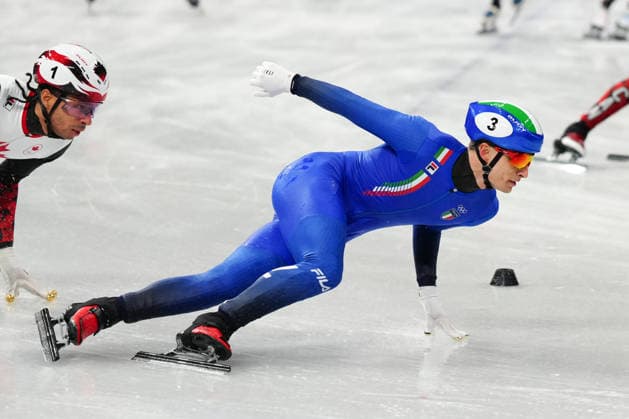 Pietro Sighel competing in the Olympic Short Track Speed skating, Eisschnelllauf Men s 5000m Relay Semifinals for the Milano Cortina 2026 Winter Olympics, in Milan (Italy) February 14, 2026 (Photo Claudio Furlan LaPresse)  Copyright: xClaudioxFurlan LaPressex