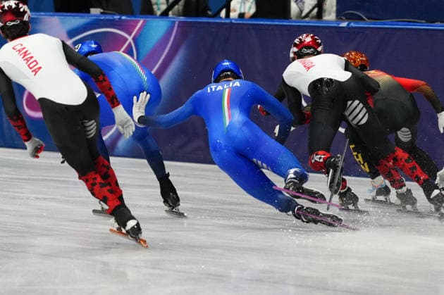 Luca Spechenhauser competing in the Olympic Short Track Speed skating, Eisschnelllauf Men s 5000m Relay Semifinals for the Milano Cortina 2026 Winter Olympics, in Milan (Italy) February 14, 2026 (Photo Claudio Furlan LaPresse)  Copyright: xClaudioxFurlan LaPressex