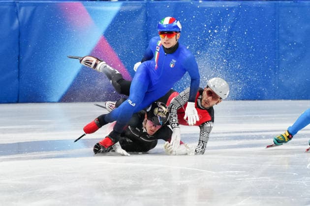 SIGHEL Pietro competing in the Olympic Short Track Speed skating, Eisschnelllauf Men s 500m Heats for the Milano Cortina 2026 Winter Olympics, in Milan (Italy) February 14, 2026 (Photo Claudio Furlan LaPresse)  Copyright: xClaudioxFurlan LaPressex