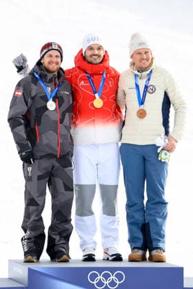 OLYMPICS - Winter Olympic Games, Olympische Spiele, Olympia, OS Milano Cortina 2026 BORMIO,ITALY,16.FEB.26 - OLYMPICS, ALPINE SKIING - Winter Olympic Games Milano Cortina 2026, slalom, men, medal ceremony. Image shows the rejoicing of Fabio Gstrein (AUT), Loic Meillard (SUI) and Henrik Kristoffersen (NOR). Keywords: medal.  GEPAxpictures xWolfgangxGrebien