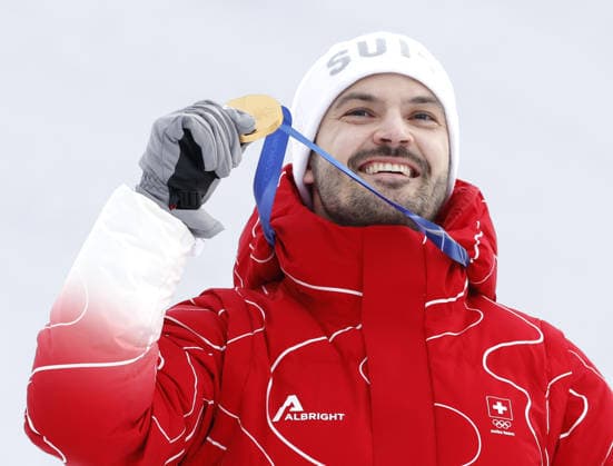 Milan Cortina Olympics: Alpine skiing Loic Meillard of Switzerland poses after winning the men s Alpine skiing slalom gold at the Milan Cortina Olympics on Feb. 16, 2026, at Stelvio Ski Centre in Bormio, Italy.  A14AA0005293255P