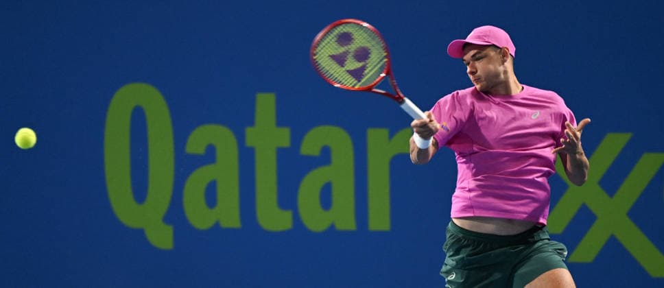 Qatar ExxonMobil Open 2026 - Day One DOHA, QATAR FEBRUARY 16: Kamil Majchrzak of Poland competes against Arthur Fils of France during a singles match at the Qatar ExxonMobil Open at the Khalifa International Tennis and Squash Complex on February 16, 2026 in Doha, Qatar. Doha Qatar  Copyright: xArturxWidakx originalFilename:widak-qatarexx260216_npG4q.jpg