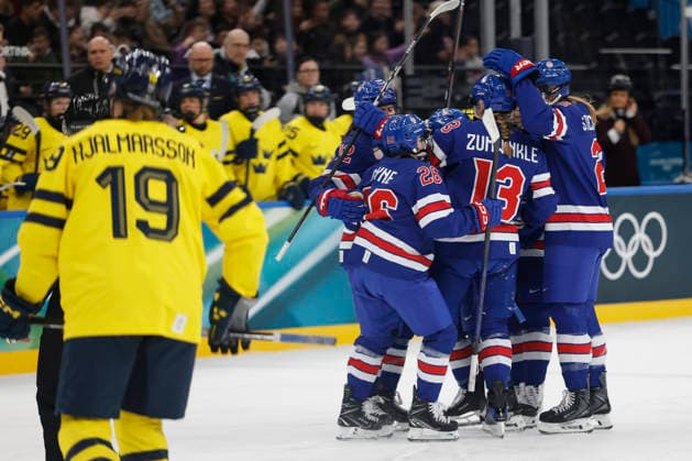 Team USA celebrates a goal in the first period by Cayla Barnes (3) against Sweden at 2026 Milano Cortina Olympics in Milan Italy on Sunday, February 15, 2026.  OLY20260216302 AARONxJOSEFCZYK