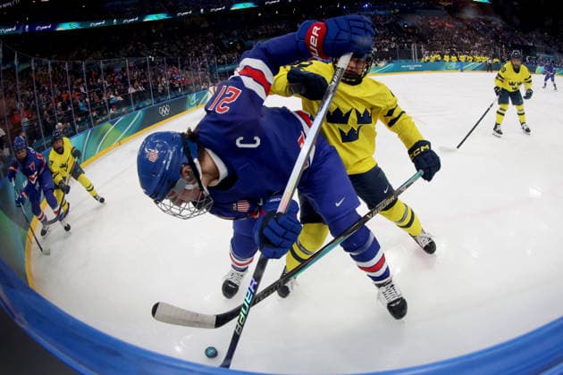 February 16, 2026, Milan, Italy: HILARY KNIGHT (USA) trying to control puck in women s semifinal Ice hockey, Eishockey game against Sweden during the Milano Cortina 2026 Olympic Winter games, Winterspiele,Spiele, Summer games Olympics 2026: Milano Cortina: Ice Hockey Women Semifinal USA-SWE  - ZUMAm117 20260216_oly_m117_006 Copyright: xDavidxMcIntyrex
