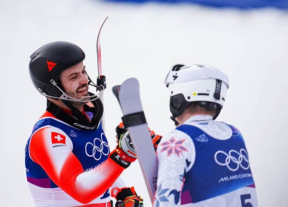 (260216) -- BORMIO, Feb. 16, 2026 -- Gold medalist Loic Meillard (L) of Switzerland shakes hands with bronze medalist Henrik Kristoffersen of Norway after the alpine skiing men s slalom event at the Milan-Cortina 2026 Olympic Winter games, Winterspiele,Spiele, Summer games in Bormio, Italy, Feb. 16, 2026. ) (MICO2026)ITALY-BORMIO-OLYMPIC WINTER GAMES-ALPINE SKIING-MEN S SLALOM YanxLinyun 