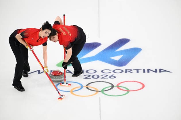(260216) -- CORTINA D AMPEZZO, Feb. 16, 2026 -- Dong Ziqi (R) and Jiang Jiayi of China compete during the curling women round robin session 7 match between China and Canada at the 2026 Milan-Cortina Winter Olympics in Cortina, Italy, Feb. 16, 2026. ) (MICO2026)ITALY-CORTINA D AMPEZZO-OLYMPIC Winter games, Winterspiele,Spiele, Summer games CURLING-WOMEN-ROUND ROBIN-CHN VS CAN LianxYi 