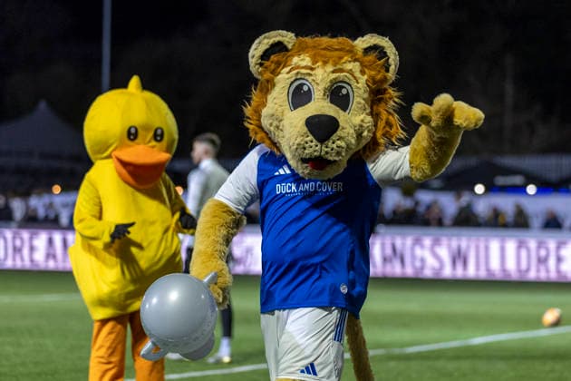 16th February 2026; Leasing Com Stadium, Macclesfield, Cheshire, England; FA Cup Football, Macclesfield versus Brentford; The Macclesfield mascot Roary the Lion on the pitch  TimxWilliams Content restricted for UK based newspaper