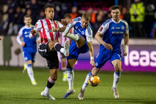 16th February 2026; Leasing Com Stadium, Macclesfield, Cheshire, England; FA Cup Football, Macclesfield versus Brentford; Lewis Fensome of Macclesfield is tackled by Antoni Milambo of Brentford  TimxWilliams Content restricted for UK based newspaper